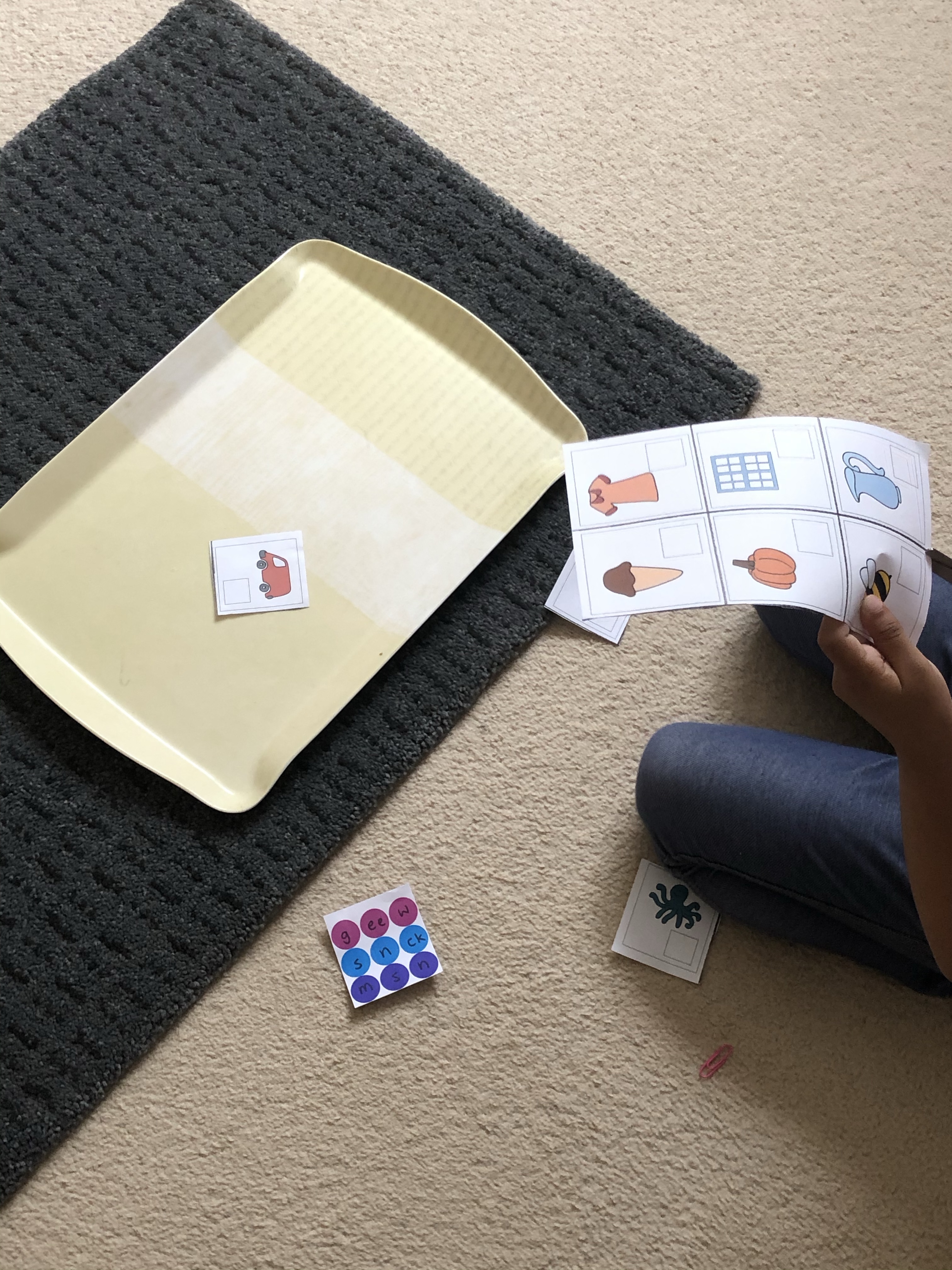 My 4 year old daughter having fun cutting up a worksheet as a learning activity